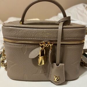 Louis Vuitton beige Vanity PM Empreinte bag